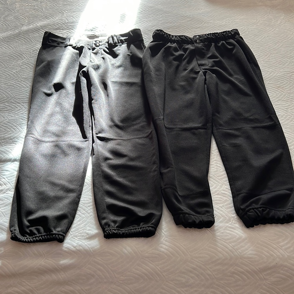 2 pairs black softball pants-size M
